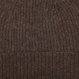 A close up of a William Lockie Porcupine Brown Cashmere Fine Ribbed Beanie.