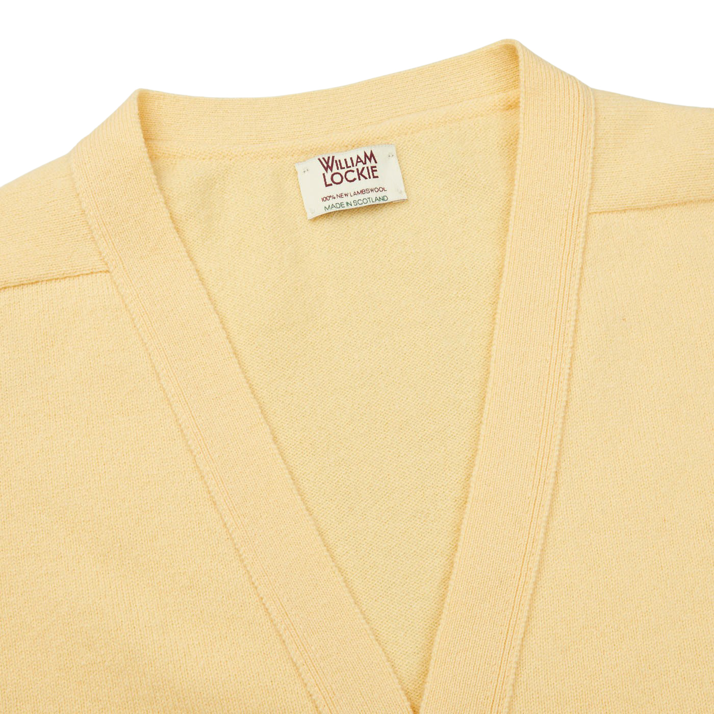 This regular fit, Solar Yellow Lambswool Saddle Shoulder Cardigan is crafted from Scottish lambswool, made by William Lockie.