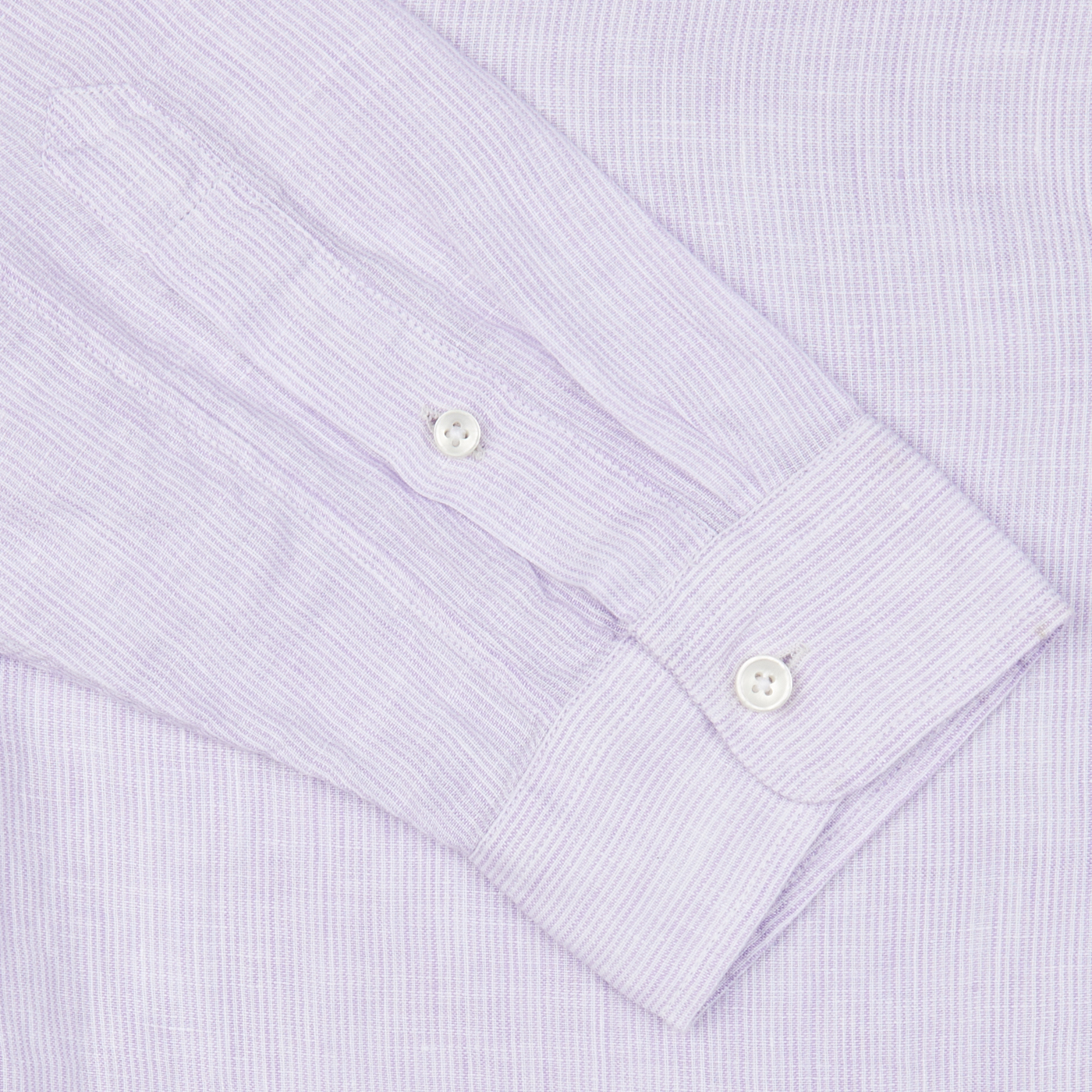 Close-up of a Xacus Lilac Striped Washed Linen Legacy Shirt cuff with two white buttons.