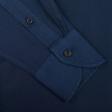 A close-up of an Xacus Navy Blue Cotton Twill Tailor Fit Shirt cuff with buttons.