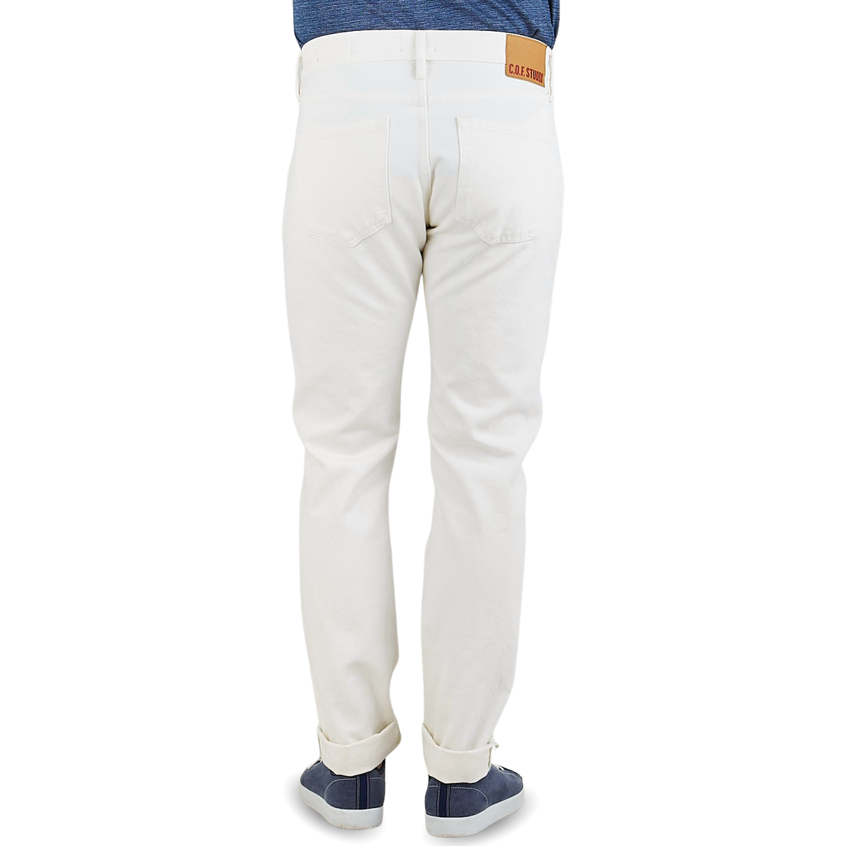 The back view of a man wearing C.O.F Studio's Ecru Stone Washed Kuroki Cotton M7 Jeans.