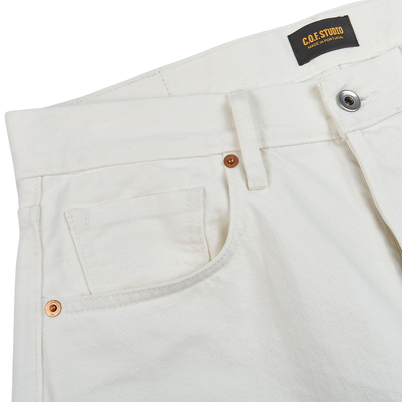 The back pocket of a white pair of Ecru Stone Washed Kuroki Cotton M7 Jeans by C.O.F Studio.