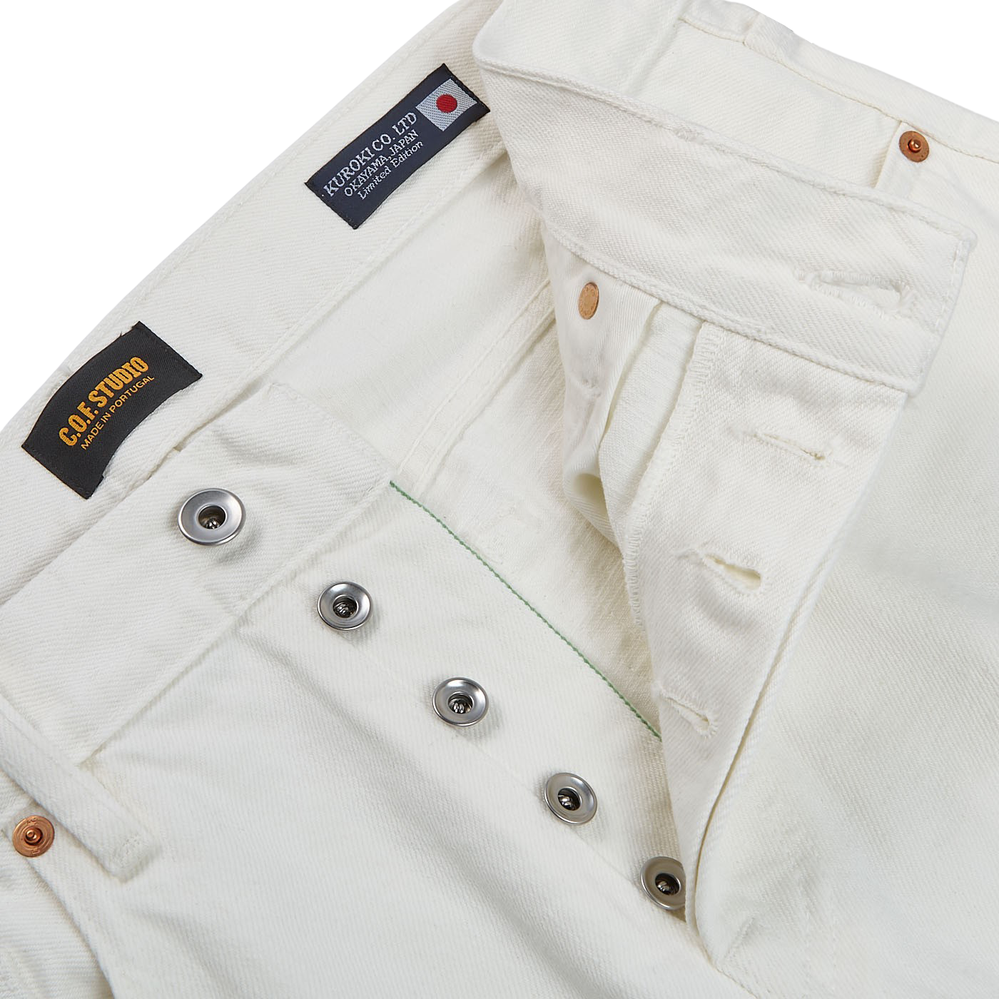 A pair of Ecru Stone Washed Kuroki Cotton M7 Jeans with buttons, organic denim, from C.O.F Studio.