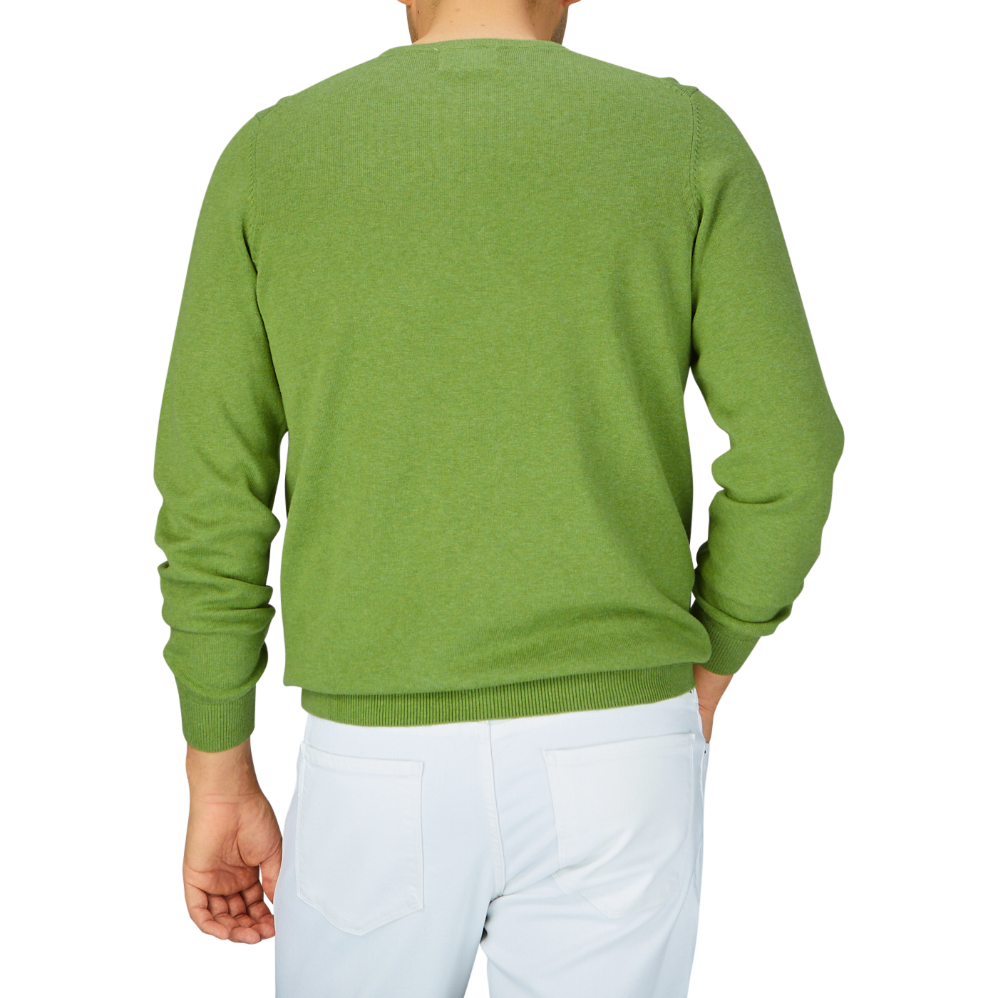 Rear view of a person wearing an Avocado Green Luxury Cotton Crewneck by Alan Paine and white pants.
