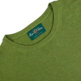 Avocado Green Luxury Cotton Crewneck sweater with a label showing the brand "Alan Paine - London estd 1975.