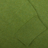 Close-up of an Avocado Green Luxury Cotton Crewneck knitted fabric with ribbed detail by Alan Paine.