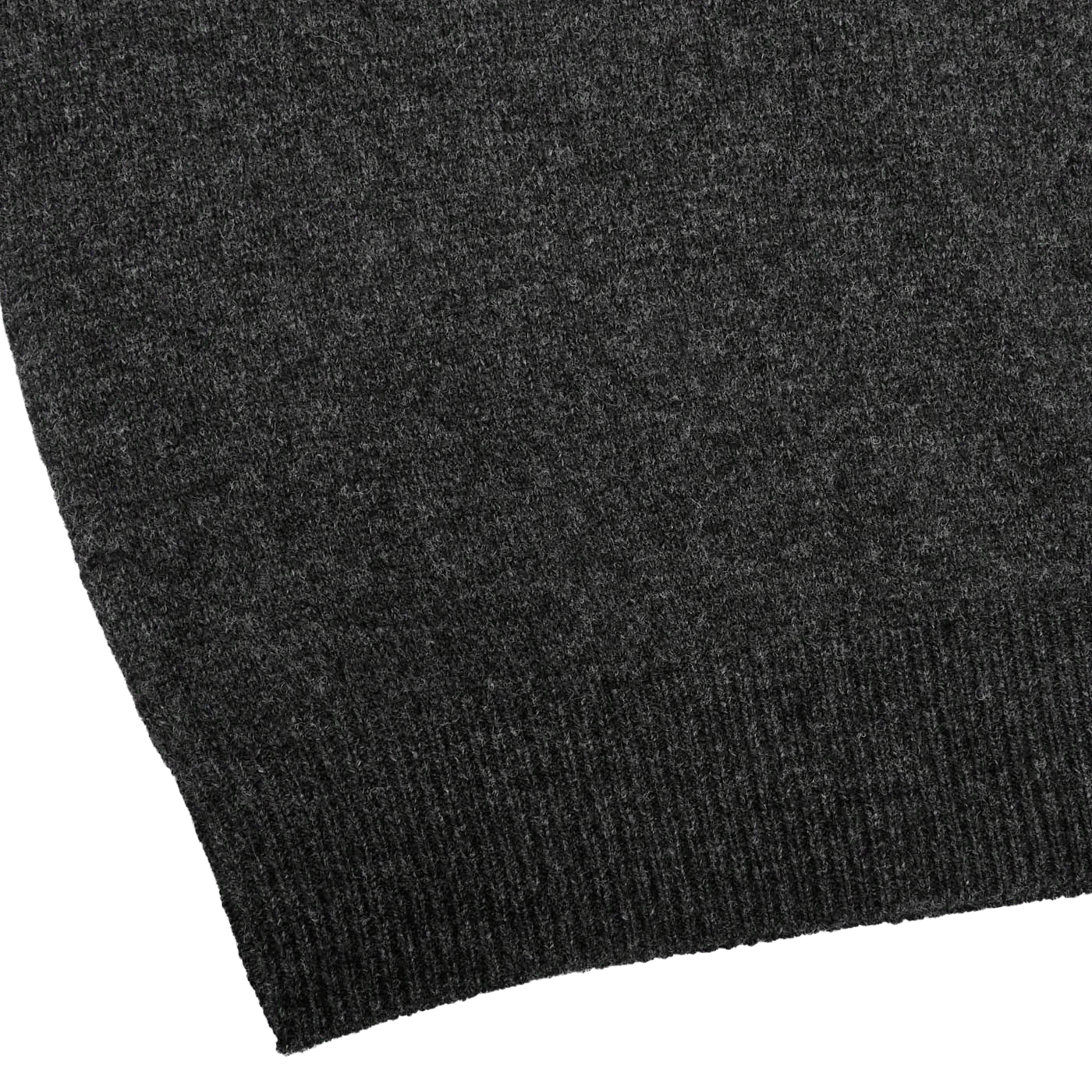 Close-up of a Charcoal Grey Lambswool Crew Neck sweater by Alan Paine, featuring a ribbed hem on the lower edge.