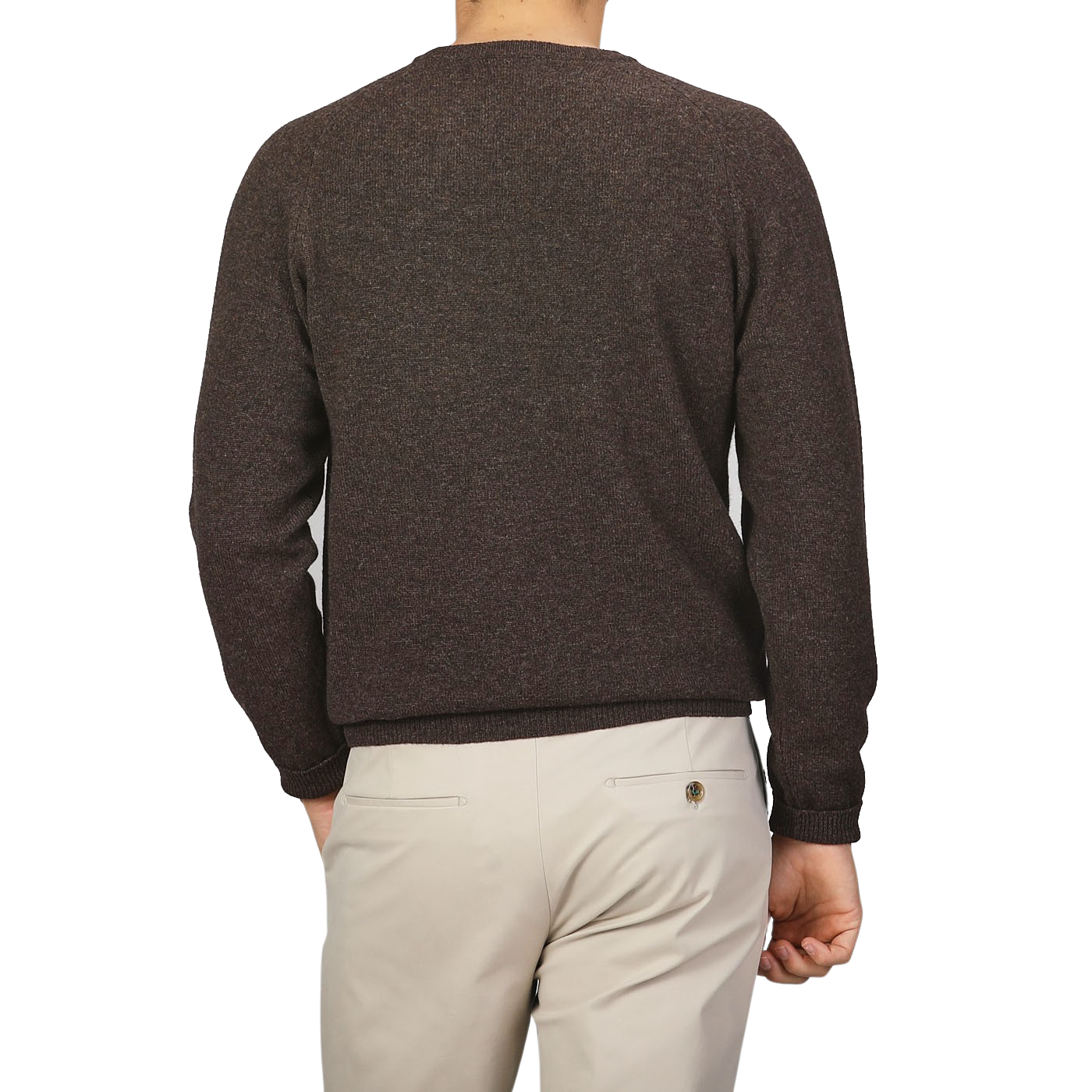 A person is shown from the back, wearing the Cocoa Brown Lambswool Crew Neck by Alan Paine and light beige pants.