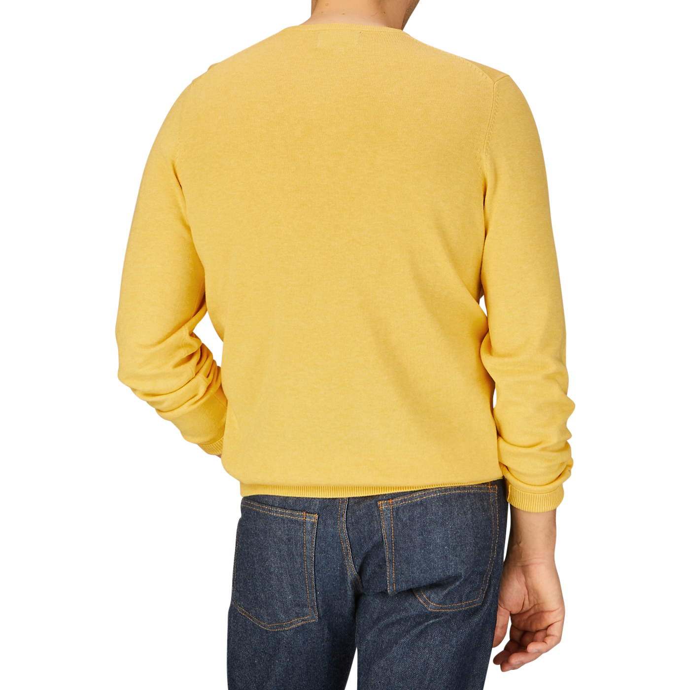 Rear view of a person wearing an Alan Paine Corn Yellow Luxury Cotton Crewneck and blue jeans.