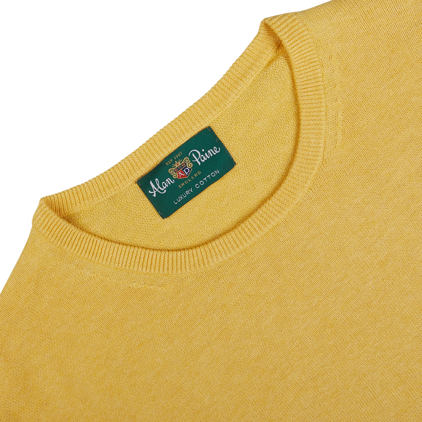 Corn Yellow Luxury Cotton Crewneck sweater with a clothing label that reads "Alan Paine, luxury cotton cashmere.