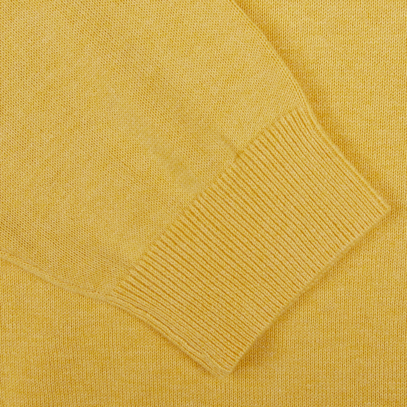 Close-up of an Alan Paine Corn Yellow Luxury Cotton Crewneck with ribbed texture detailing.