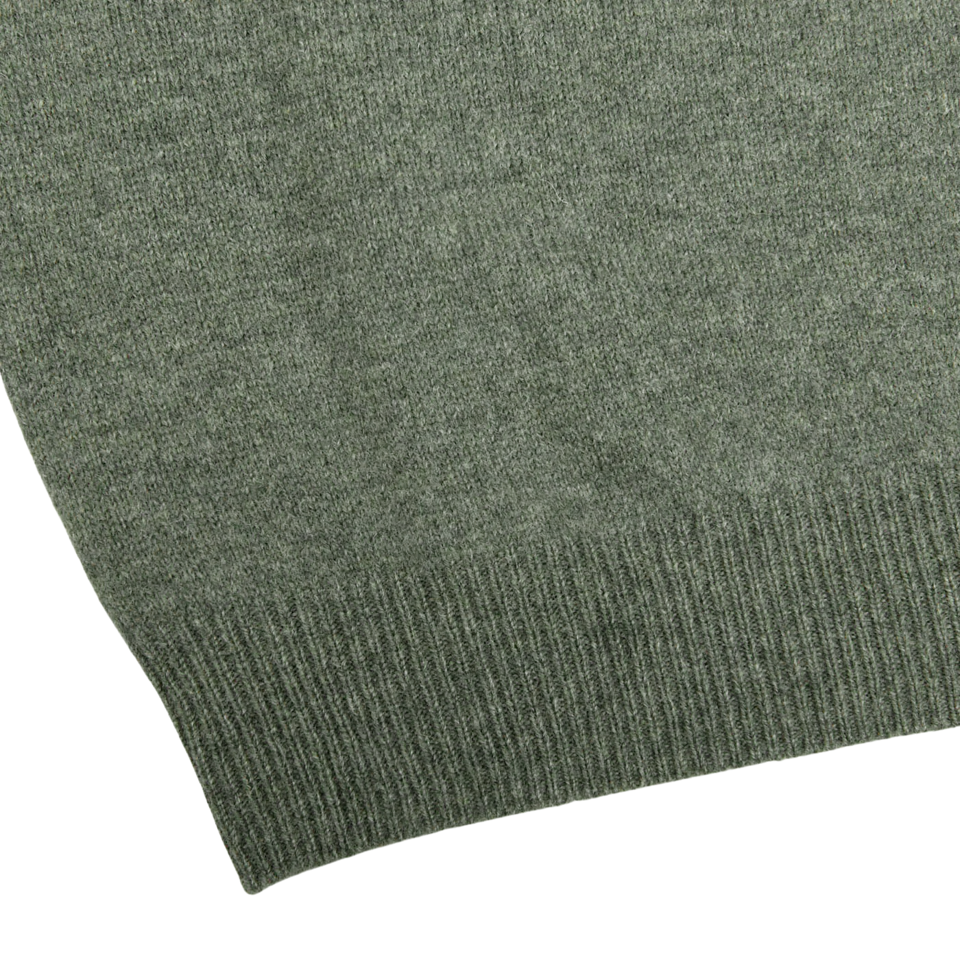 Close-up of the bottom edge of the Alan Paine Landscape Green Lambswool V-Neck, featuring a ribbed hem detail on this Australian lambswool knitted sweater.