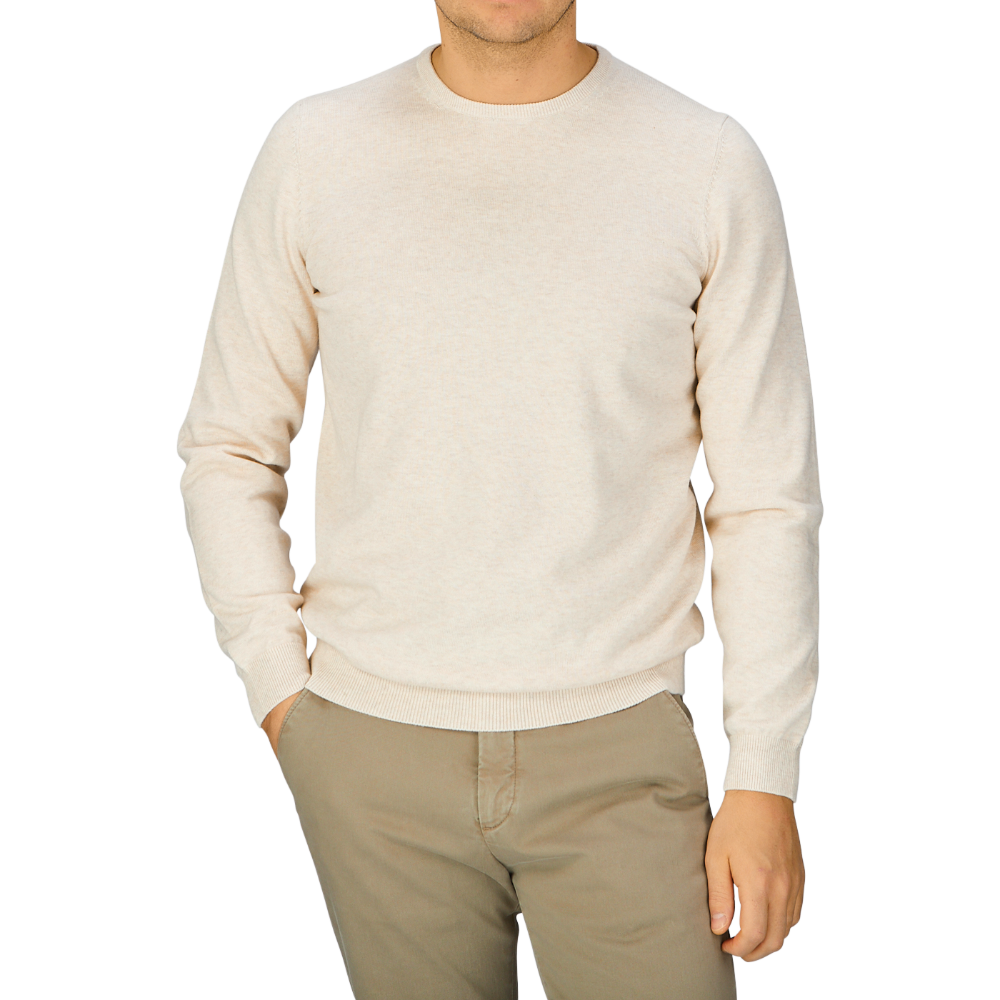 A man wearing an Alan Paine Light Beige Luxury Cotton Crewneck sweater and khaki pants.