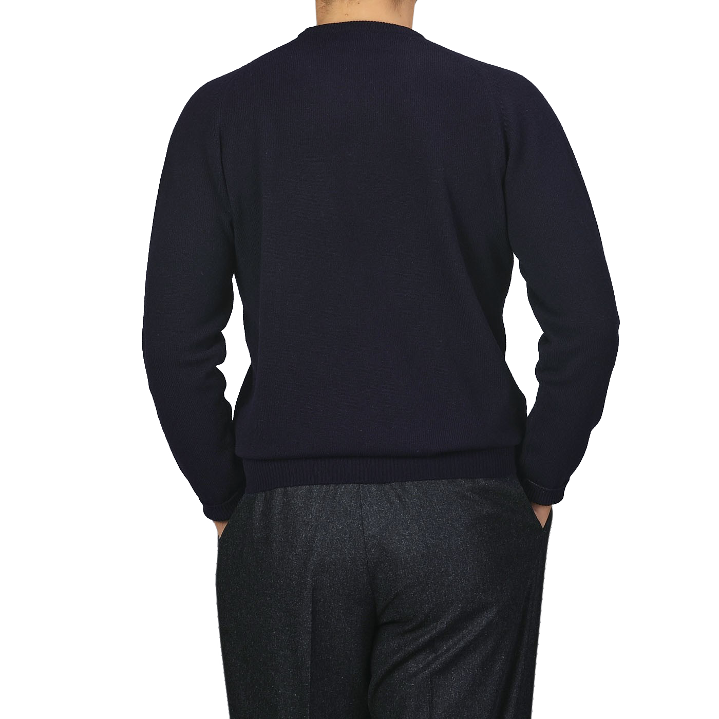 A person wearing an Alan Paine Navy Blue Lambswool Crew Neck and gray pants is photographed from the back against a light gray background.