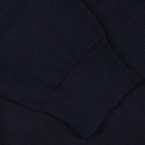 Close-up of Alan Paine's Navy Blue Luxury Cotton Crewneck with a ribbed cuff detail.