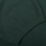 Close-up of a Alan Paine Racing Green Knitted Cotton Polo Shirt texture with ribbed hem.