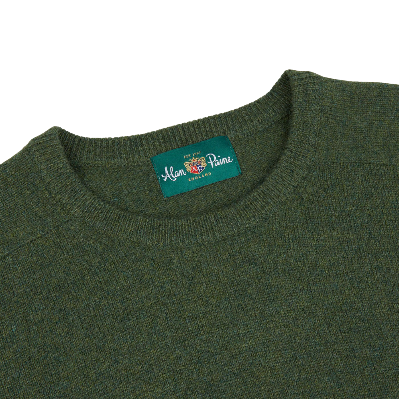 An Alan Paine crew neck sweater in rosemary green, made of lambswool.