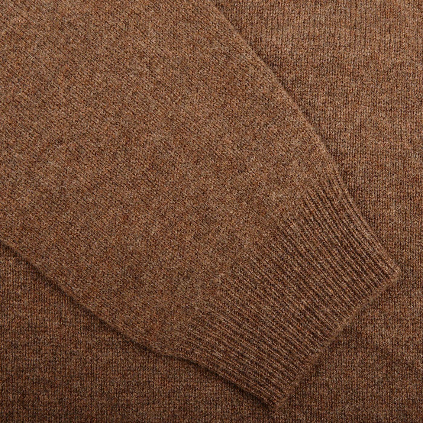 Close-up of the sleeve of the Alan Paine Tobacco Brown Lambswool Crew Neck, showcasing the texture of luxurious Australian lambswool and ribbed cuff detailing.