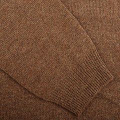 Close-up of the sleeve of the Alan Paine Tobacco Brown Lambswool Crew Neck, showcasing the texture of luxurious Australian lambswool and ribbed cuff detailing.