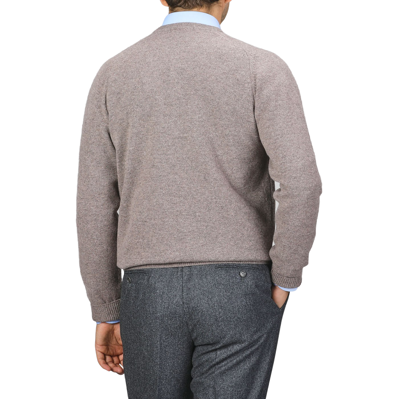 A person wearing an Alan Paine Vole Beige Lambswool V-Neck sweater and dark gray pants is shown from the back against a plain background.