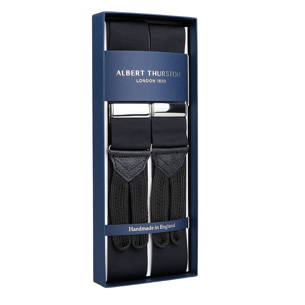 A pair of handmade Albert Thurston Black Nylon Leather 40mm Braces displayed in an elegant box.