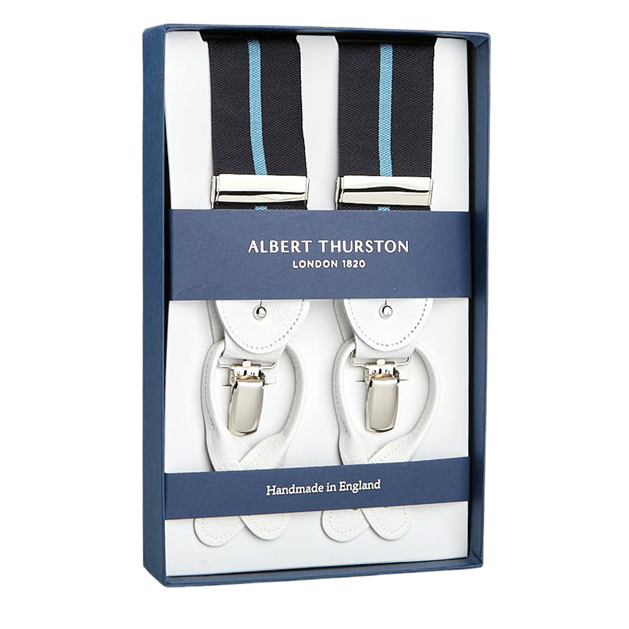 A boxed set of Albert Thurston suspenders, featuring white leather and blue Eton stripe elastic straps, labeled "Handmade in England" and inspired by Gordon Gekko from Wall Street.