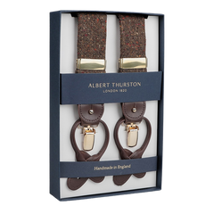 Albert Thurston's Dark Brown Donegal Tweed 35mm Braces, proudly handcrafted in England, feature brown leather fastenings and luxurious Donegal wool tweed.