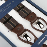A pair of Dark Taupe Striped Nylon 35mm Braces featuring dark taupe striped nylon elastic with leather and metal clasps, packaged in a blue box labeled "Albert Thurston London 1820" and "Handmade in England".