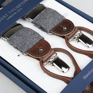 Three pairs of Light Grey Wool Flannel 35 mm Braces with leather details and displayed in an elegant blue box with the label "Albert Thurston".