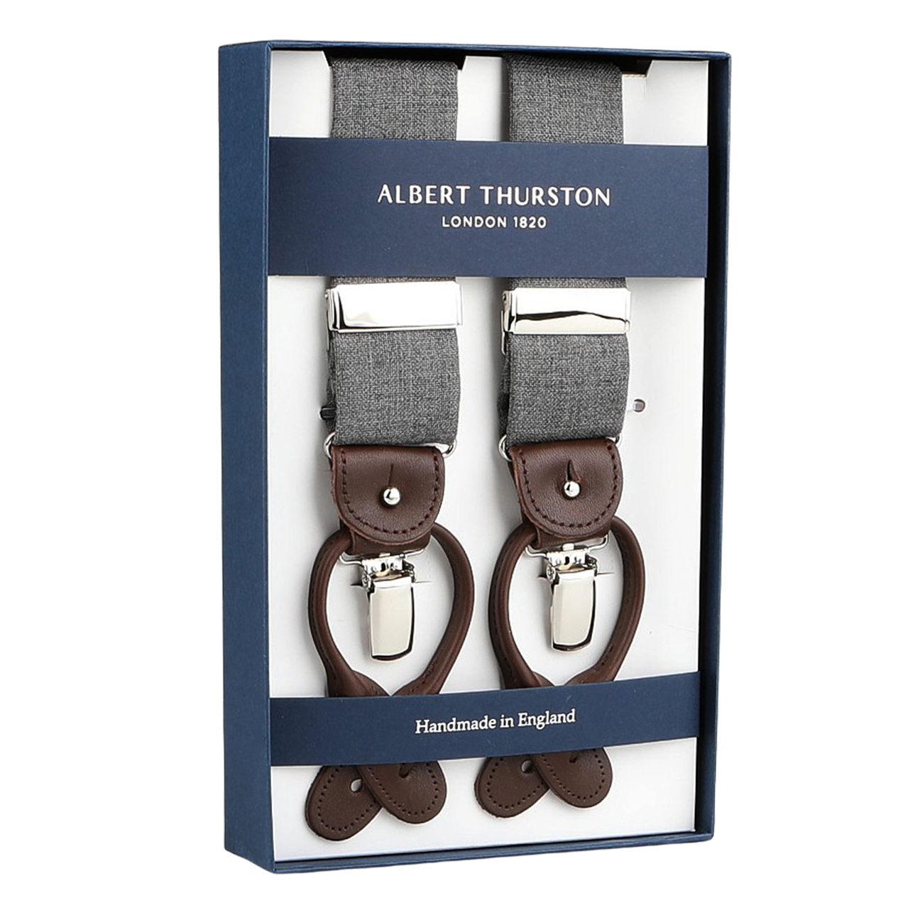 Box of "Light Grey Wool Fresco 35mm Braces" features gray fabric with brown leather details and metal clips. Labeled "Albert Thurston," it proudly states "Handmade in England," showcasing meticulous craftsmanship.