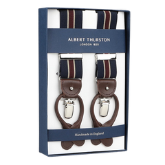 Albert Thurston's boxed handmade braces, labeled as Navy Burgundy Striped Nylon Elastic 35mm Braces, showcase a navy blue-burgundy pattern with brown leather and silver clips, proudly crafted in England.