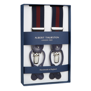 A pair of Albert Thurston Navy Burgundy Striped Nylon Leather 35 mm Braces, displayed in a box, indicating they are handmade in England.