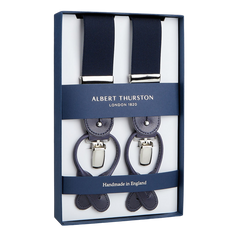 A pair of Albert Thurston Navy Elastic Nylon 35 mm Braces packaged in a box, indicating they are handmade in England.