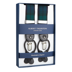 A boxed pair of Albert Thurston Navy Green Wool Black Watch 35 mm braces with leather fittings, advertised as handmade in England.