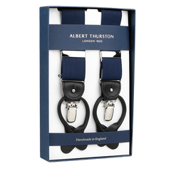 Albert Thurston's boxed set features Navy Nylon Black Leather 35 mm Braces with stretchable navy nylon, black leather straps, and silver clips, elegantly labeled "Handmade in England.