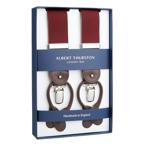 A pair of Albert Thurston Wine Red Nylon Elastic 35mm braces with leather accents, presented in a box.