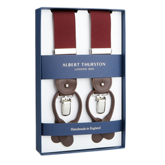 A pair of Albert Thurston Wine Red Nylon Elastic 35mm braces with leather accents, presented in a box.