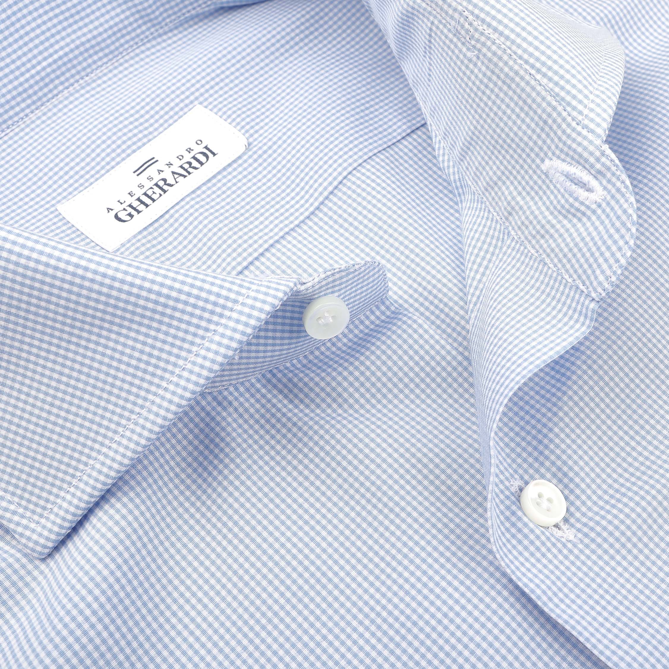 Close-up of Alessandro Gherardi's Blue Gingham Checked Cotton Single Cuff Shirt, featuring a label inside the collar.