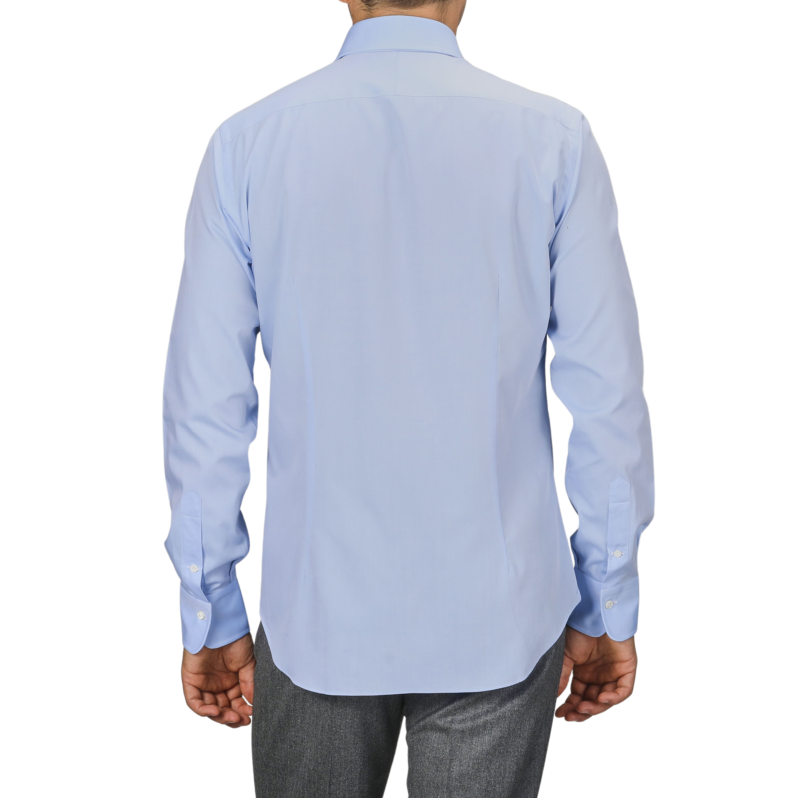 A person wearing a light blue Sky Blue Cotton Twill Single Cuff Shirt by Alessandro Gherardi and gray pants, viewed from the back.