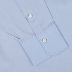 Close-up of an Alessandro Gherardi Sky Blue Cotton Twill Single Cuff Shirt sleeve, showcasing two white buttons on the pure cotton cuff.