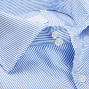 A close up of a fitted cut Alexander Kraft Monte Carlo Blue White Bengal Stripe Cotton Double Cuff Shirt.