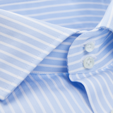 A close up of an Alexander Kraft Monte Carlo Blue White Striped Cotton Single Cuff Shirt with Egyptian cotton fabric.