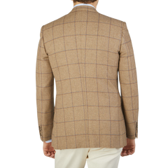 The back view of a man wearing the stylish Alexander Kraft Monte Carlo Caramel Estate Wool Tweed Provence Jacket.