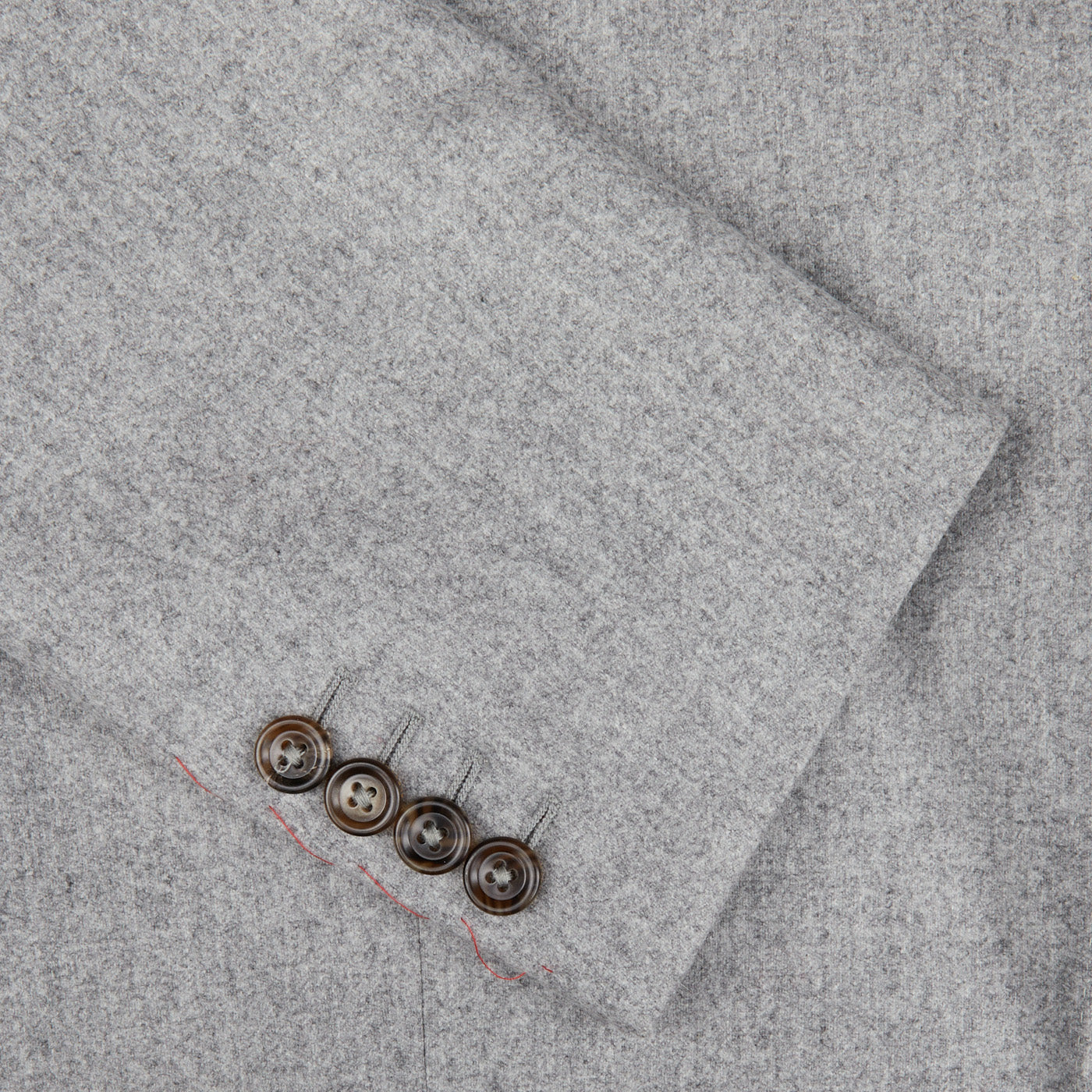 A close up of a Light Grey VBC Wool Flannel Signature Jacket with buttons made in Italy from pure wool flannel by Alexander Kraft Monte Carlo.