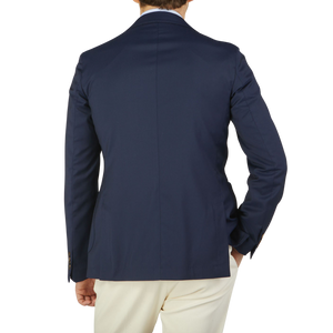 The back view of Alexander Kraft wearing a Navy Blue Loro Piana Wool Unstructured PPJ Jacket by Alexander Kraft Monte Carlo.