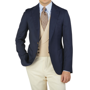 Alexander Kraft is posing in a Navy Blue Loro Piana Wool Unstructured PPJ Jacket by Alexander Kraft Monte Carlo.