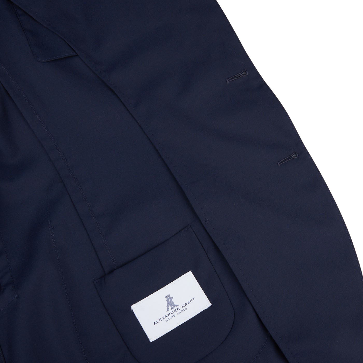 The back of a Navy Blue Loro Piana Wool Unstructured PPJ Jacket with an Alexander Kraft Monte Carlo label on it.