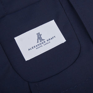 A close up of an Alexander Kraft Monte Carlo Navy Blue Loro Piana Wool Unstructured PPJ Jacket with a label on it.