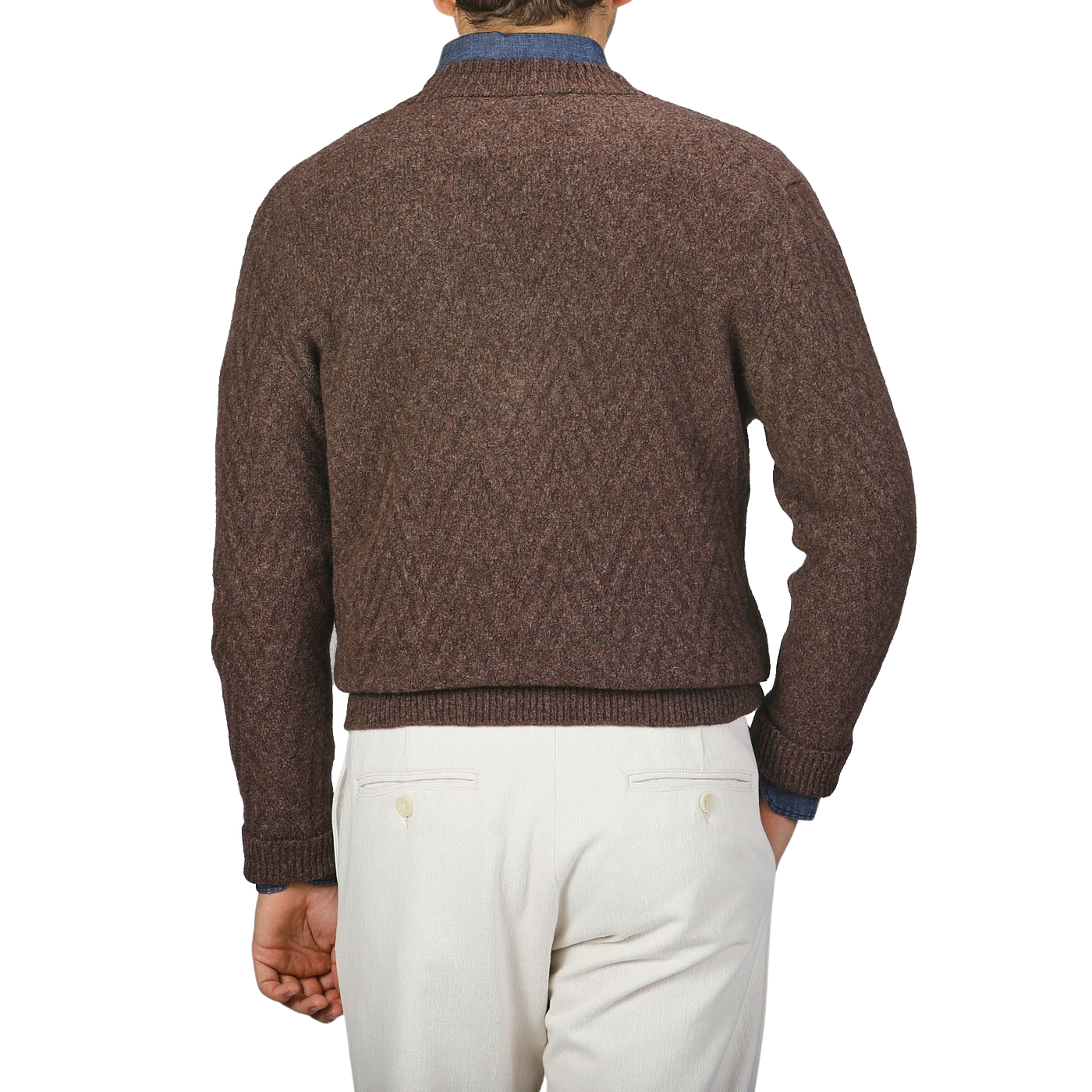 A person wearing an Altea Brown Wool Chevron Knit V-Neck and white pants is shown from the back against a plain background.