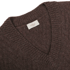 Close-up of the Brown Wool Chevron Knit V-Neck by Altea, featuring a ribbed neckline and an 'altea Milano' label.